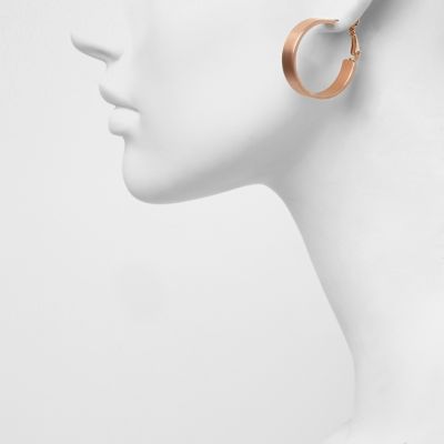 Rose gold tone medium hoop earrings